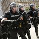 Illustration for article titled Peaceful Protest Interrupted By Swarm Of Aggressive Black-Clad Militants